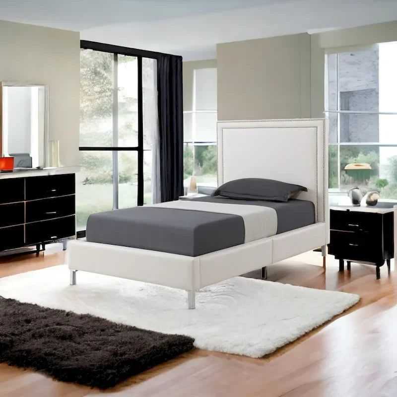 White Solid Wood Twin Bed with Faux Leather Upholstery and Nailhead Trim